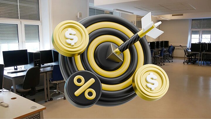 Zdjęcie sali komputerowej z grafiką przedstawiającą tarczę