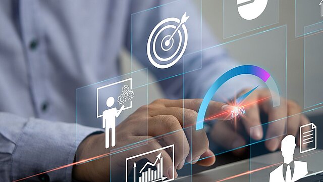 Zdjęcie dłoni opartych na stole z jednym palcem wskazującym na szybę z wygenerowanymi ikonami