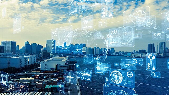 Zdjęcie panowamy miasta z wygenerowanymi cyfrowo grafikami różnych symboli