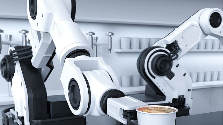 Zdjęcie dwóch ramion robota przemysłowego