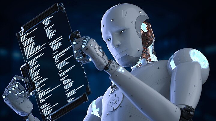 Zdjęcie humanoida trzymającego cyfrowy wyświetlacz